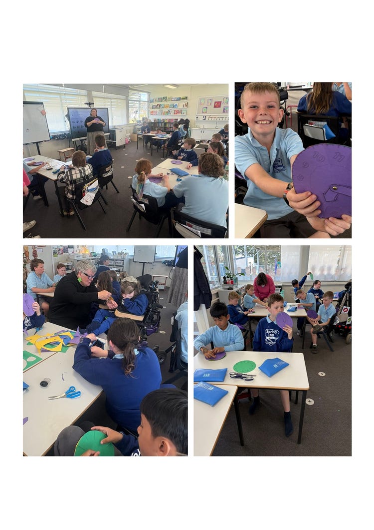 A collage of four photos. The first one is Miss Em teaching her class. The children are sitting at their desks looking at her whilst she is addressing the class. Behind her is a smart board. The second image is of a male student holding a purple paper clock that he has made. He has a very large proud smile on his face. The third image is of a teacher working with a student in a wheelchair. They are building a clock together and there are two other students at the table also building their clocks. The fourth image is of several students in the classroom sitting at their desks working on their clocks. There is a teacher in the background helping a student.